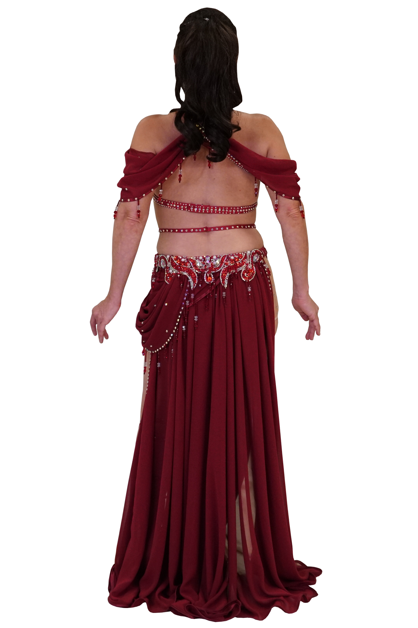 Red belly dance costume with intricate detailing on a white background