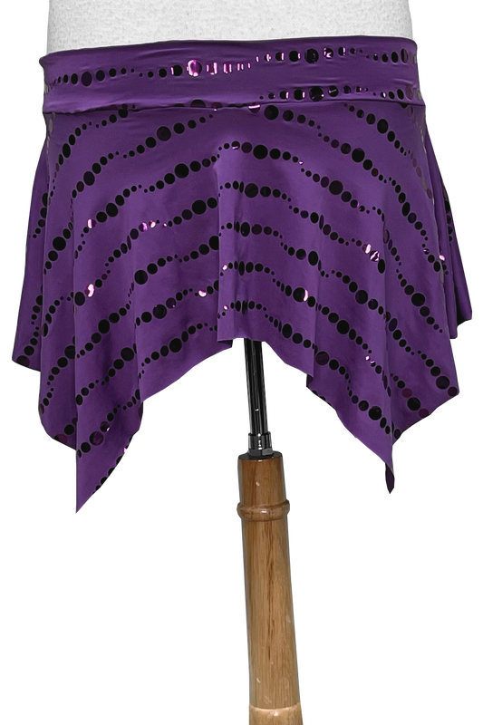 Purple sequined skirt on a white background