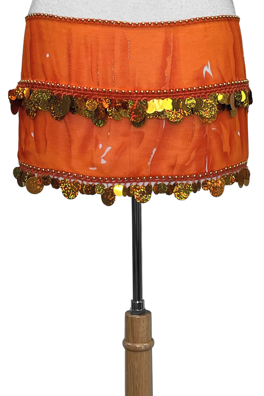 Orange hip scarf with metallic accents