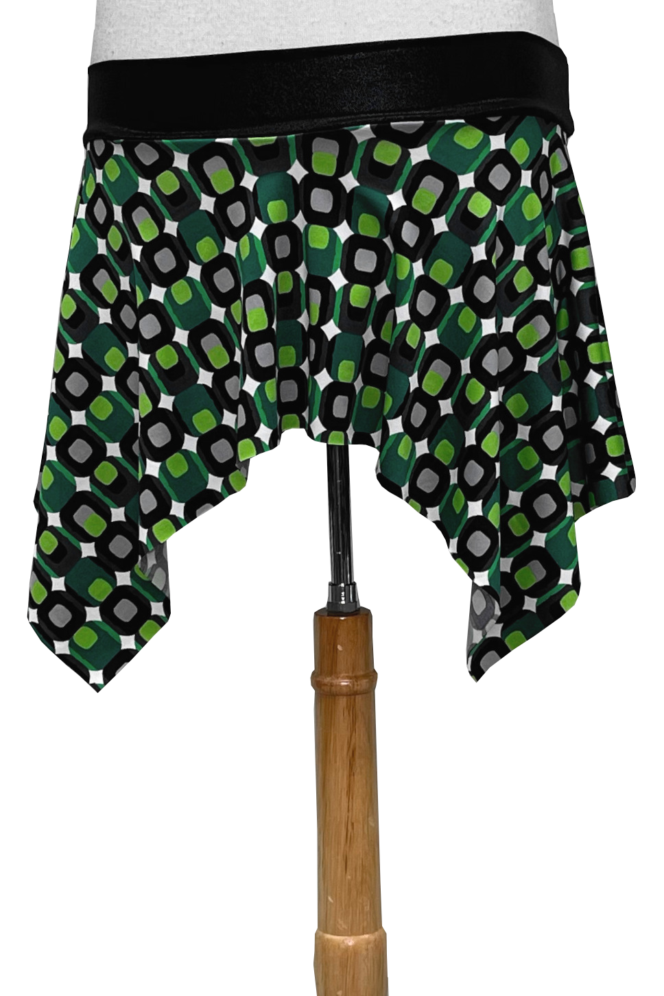 Skirt with green and black pattern on a white background