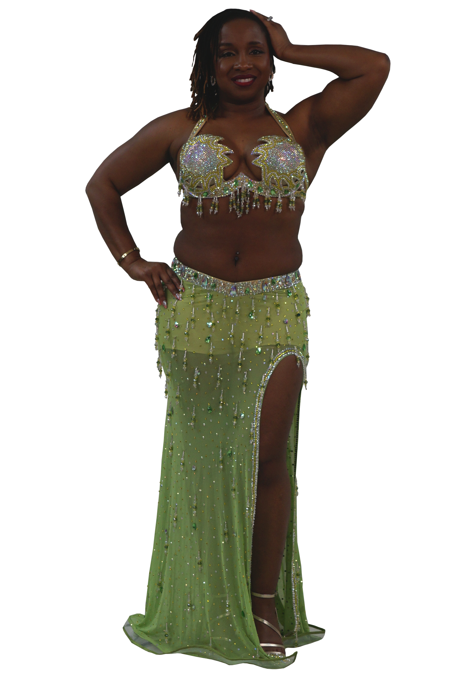 Woman wearing a green beaded bellydance costume on a white background