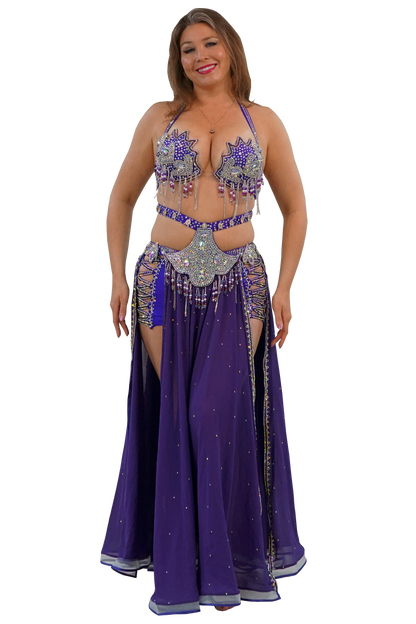 Two piece belly dance costume in purple with beads and crystals.