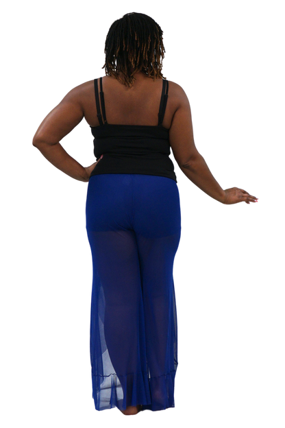 A woman shown from the back wearing a black sleeveless top and sheer royal blue wide-leg pants against a plain white background.