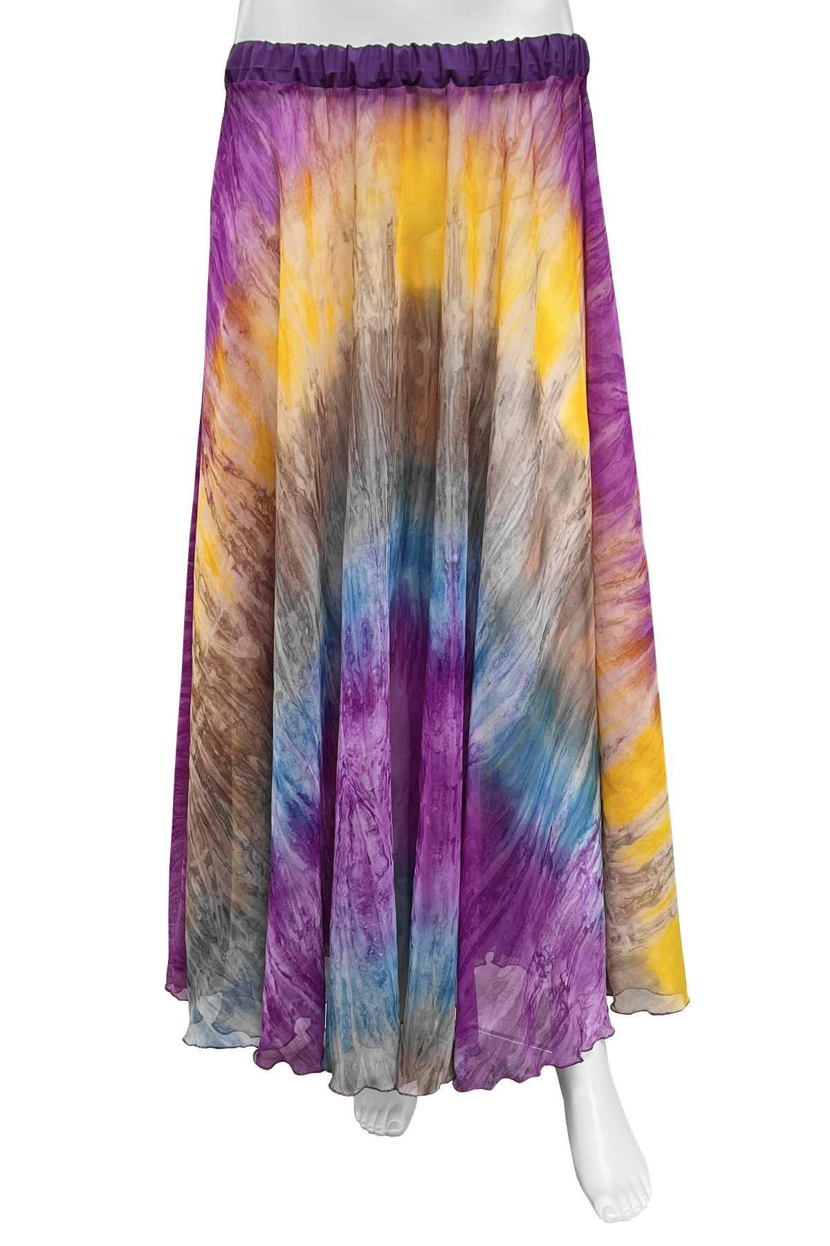 A maxi skirt with a vibrant tie-dye pattern in purple, yellow, blue, brown, and gray, displayed on a white mannequin against a solid white background.