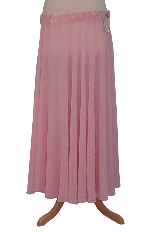 A light pink maxi skirt displayed on a mannequin stand against a plain white background.