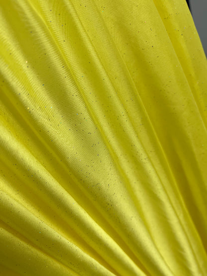 Bright yellow fabric with subtle glitter