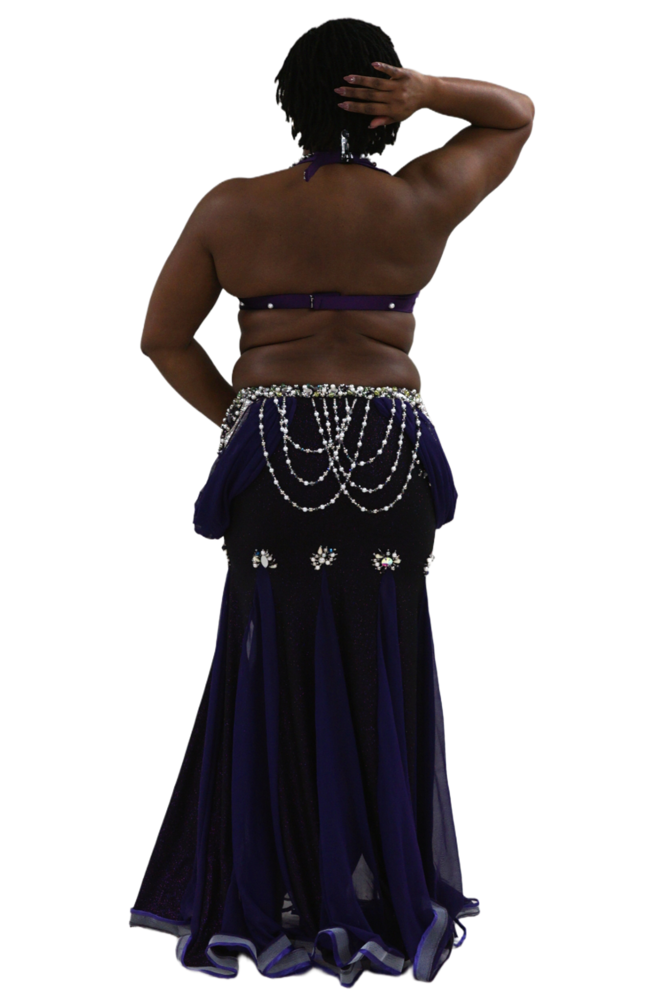 Purple belly dance costume with beaded details on a white background